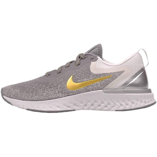 nike running escape run sneakers in white and gold
