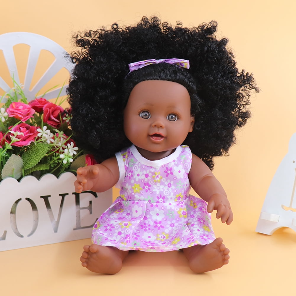 black baby doll with curly hair