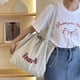 thumbnail image 1 of Ruifaya Bolso de nailon con letras, bolso de mano, bolso bandolera coreano para mujer, gran capacidad ζ, 1 of 7