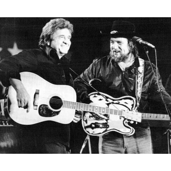 Johnny Cash Waylon Jennings play guitars on stage 1980's Poster 16x20 inches