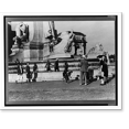 thumbnail image 2 of Historic Framed Print, Tourists arriving at Washington, D.C. Throwing pennies to colored boys in fountain across from Union Station, 17-7/8" x 21-7/8", 2 of 9