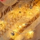 thumbnail image 5 of mfyjkho Cadena de luces LED con forma de estrella luminosa, 200 cm, doradas, para colgar en interiores y exteriores. 1 unidad., 5 of 6
