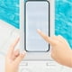 thumbnail image 4 of Bolsa impermeable universal para teléfono | Funda transparente IPX8 de PVC para smartphones hasta 6.5" | Acceso a pantalla táctil | Para natación, playa, viajes | Incluye cordón | Colores múltiples, 4 of 6