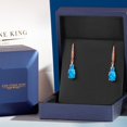 thumbnail image 5 of Gem Stone King 18K Rose Gold Plated Silver Blue Opal and White Lab Grown Diamond Dangle Earrings for Women (1.65 Cttw, Oval Cabochon 9X7MM), 5 of 6