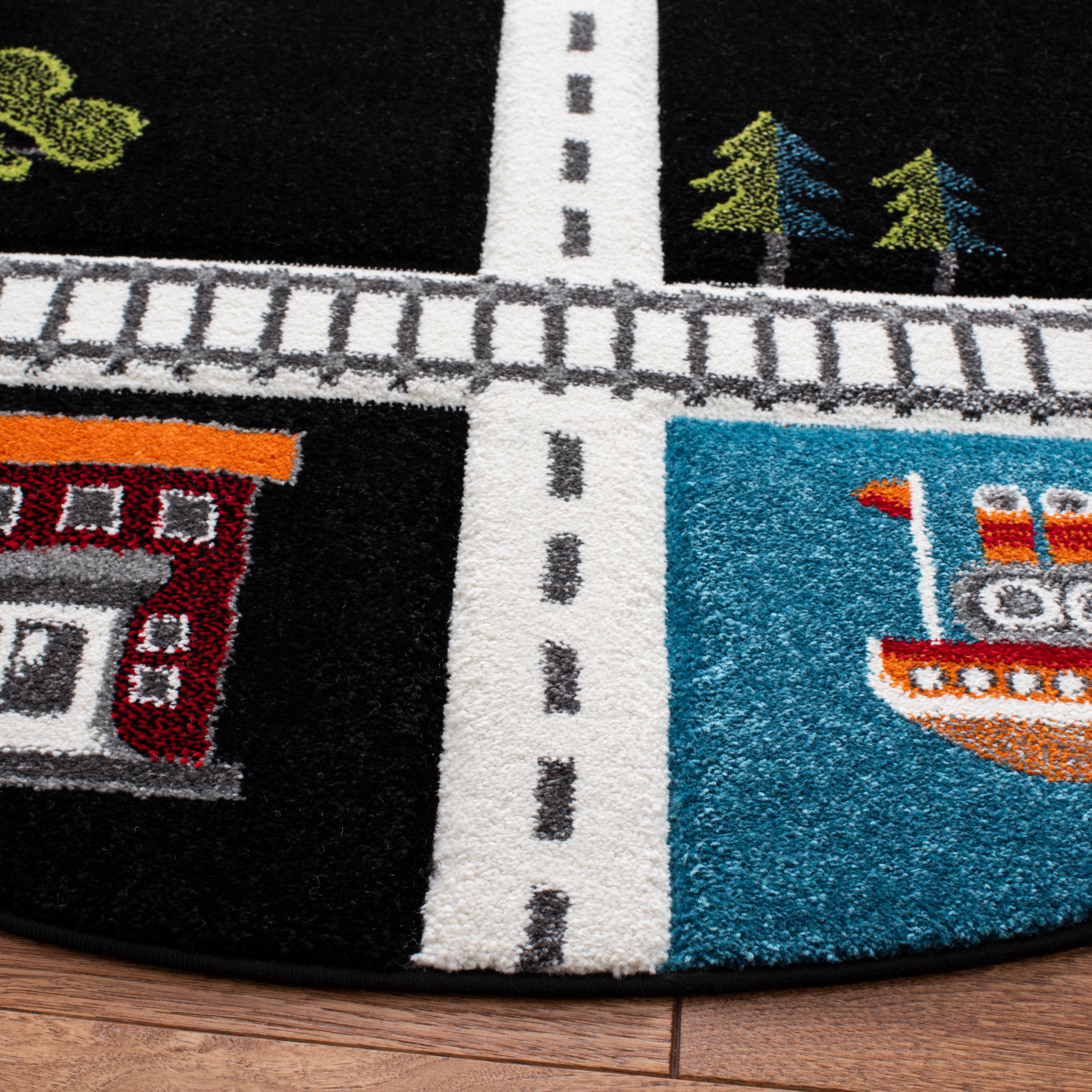 SAFAVIEH Carousel Kids Devan Train Track Area Rug, Black/Ivory, 6'7" x 6'7" Round