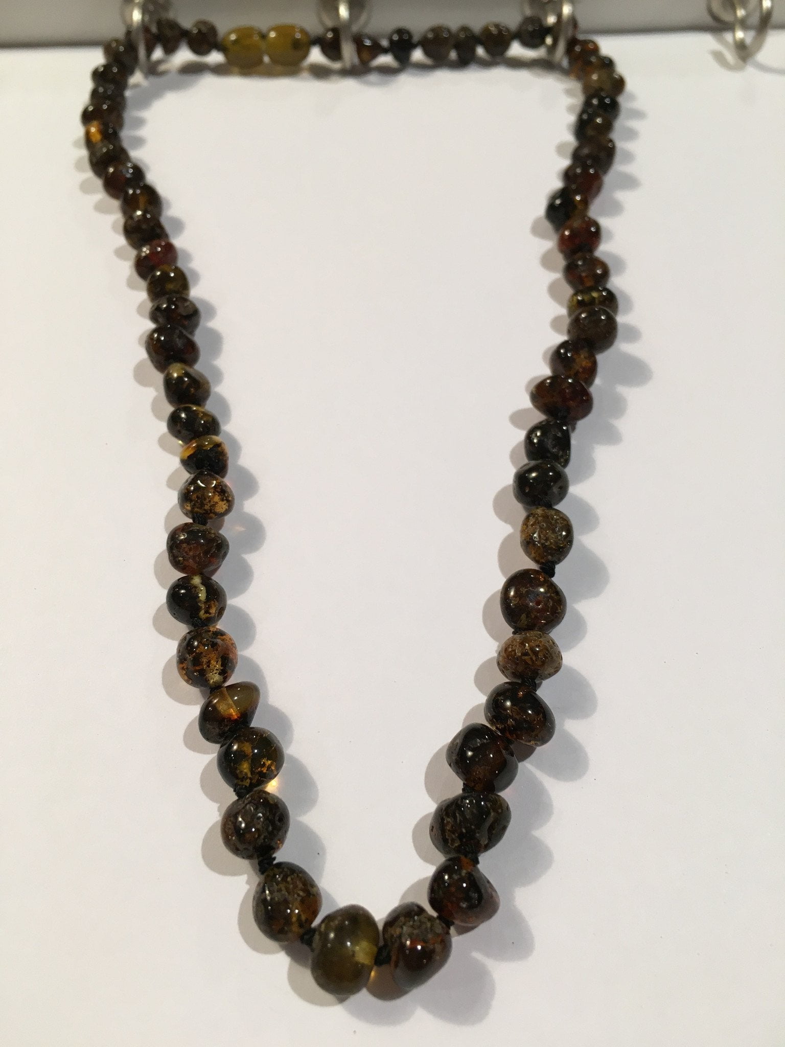 amber necklace for back pain
