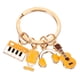thumbnail image 1 of Llavero musical con colgante, llavero con dije para bolso, llavero musical, regalo para fiesta, 1 of 8