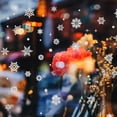 thumbnail image 4 of Agregue encanto invernal a su hogar y oficina con esta decoración de copos de nieve plateados despegables y pegables fácilmente extraíble, 4 of 5