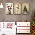 thumbnail image 2 of 3pcs set of rustic Christmas canvas prints with reindeer, pine trees and candy patterns, unframed vintage Christmas wall art, suitable for living room, bedroom, home office, perfect holiday gift, in, 2 of 4