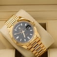 thumbnail image 2 of Pre-Owned Rolex Day-Date 40MM 228238 Black Baguette Diamond Dial Fluted Bezel 18K Yellow Gold President Bracelet, 2 of 9