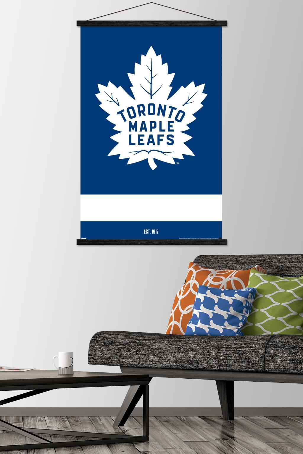 NHL Toronto Maple Leafs - Logo 21 Wall Poster with Wooden Magnetic Frame, 22.375" x 34"