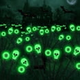 thumbnail image 1 of Luces solares FENSAN para Halloween y exteriores, paquete de 4 unidades, 32 LED, color verde, 1 of 7