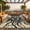Black, variant on Outdoor Rug, Patio Waterproof, Reversible Plastic Straw Rugs for Camping, Picnic, Balcony, Porch, RV, Easy-Clean & Quick Dry Sun Pattern Large Indoor Outdoor Carpet