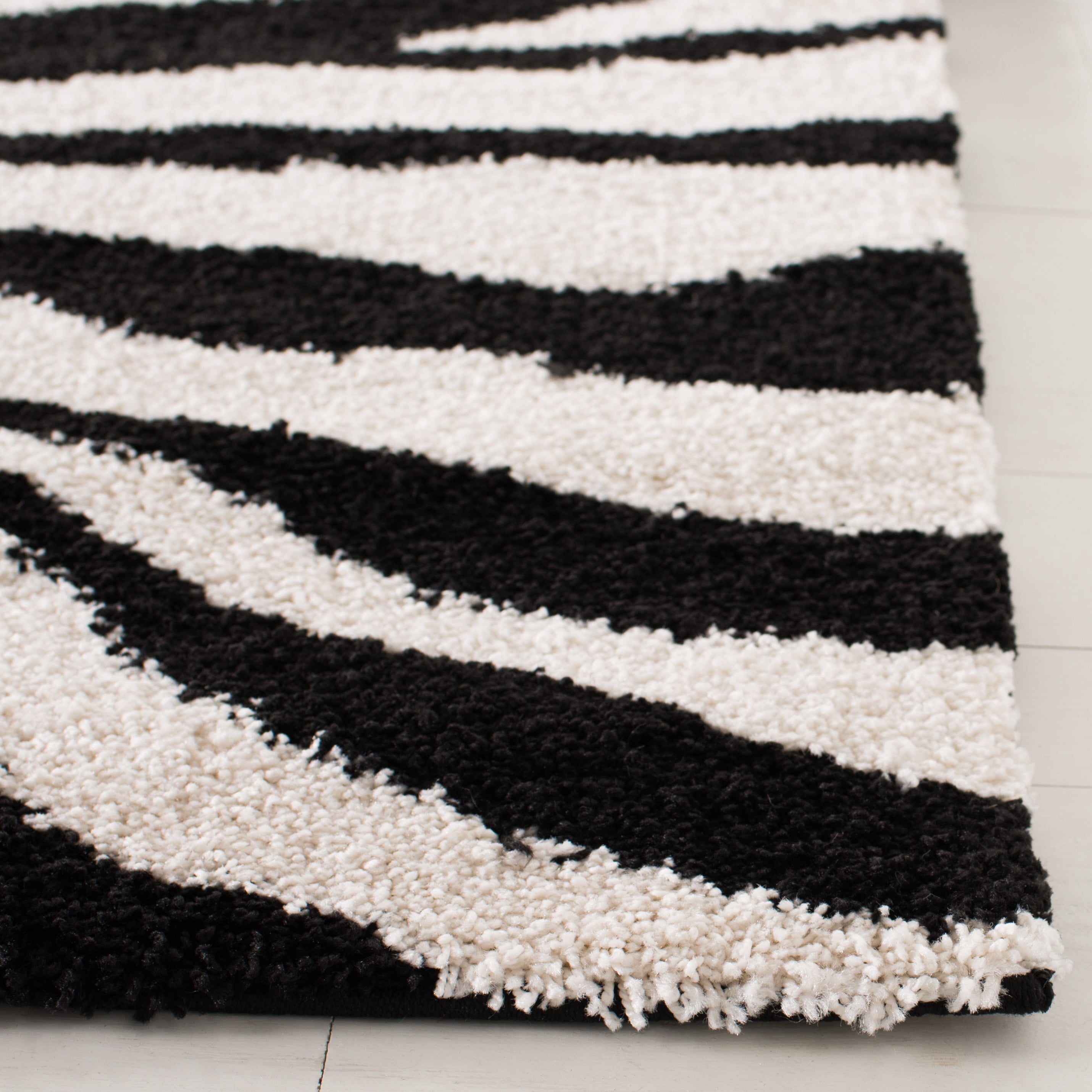 SAFAVIEH Florida Eleanor Animal Shag Runner Rug, Ivory/Black, 2'3" x 19'