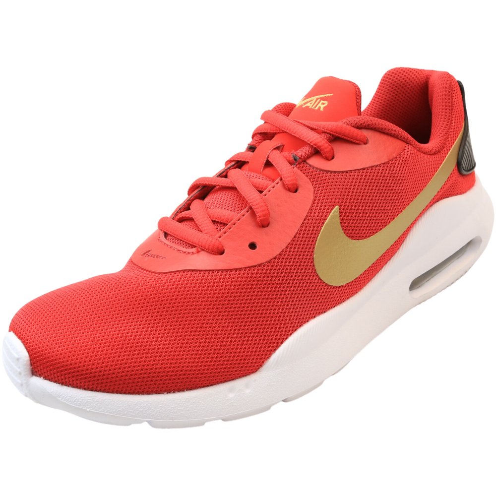 red and gold nike trainers