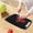 Black, variant on RnemiTe-amo Plastic Utility Cutting Board with Handles,BPA-Free, With Knife and Juice Groove,Scratch Resistant Flexible Cutting Boards for Kitchen, Dishwasher Safe, Easy-Grip Handle, Non-Slip