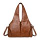 thumbnail image 1 of Bolso de hombro de piel sintética, moderno y elegante, para mujer, ideal para el trabajo y la universidad. Marrón, 1 of 9