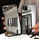 thumbnail image 1 of Funda de teléfono con espejo de borde negro para iPhone 14 13 12 11 Pro Max X XS MAX XR, funda protectora de TPU suave para iPhone 7 8 PLUS, funda con espejo Tan Jianjun unisex, 1 of 1
