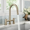 thumbnail image 4 of KRAUS Oletto Bridge Kitchen Faucet with Pull-Down Sprayhead in Spot-Free Antique Champagne Bronze, 4 of 17