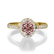 1.50 carat Oval Cut Morganite and Diamond Halo Engagement Ring in 10k Yellow Gold