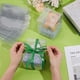 thumbnail image 3 of 15 cajas de regalo transparentes de 3,5 x 3,5 x 4,7 pulgadas, plegables, transparentes, para regalos y golosinas., 3 of 5