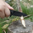 thumbnail image 4 of Ozark Trail 7.5-inch Folding Stainless Steel Knife with Camo Handle and Serrated Drop Point Blade, 4 of 10