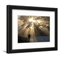 thumbnail image 1 of Man Walking Along a Street with Sun Rays Shining Through a Tree, Highlands, Myanmar, Figurative Framed Art Print Wall Art by Michael Runkel Sold by Art.Com, 1 of 1