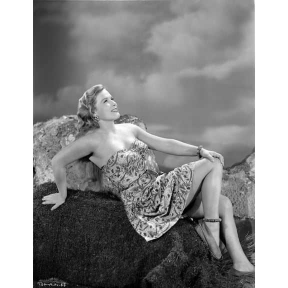 Denise Darcel Reclining on a Rock in Black and White Photo Print (24 x 30)