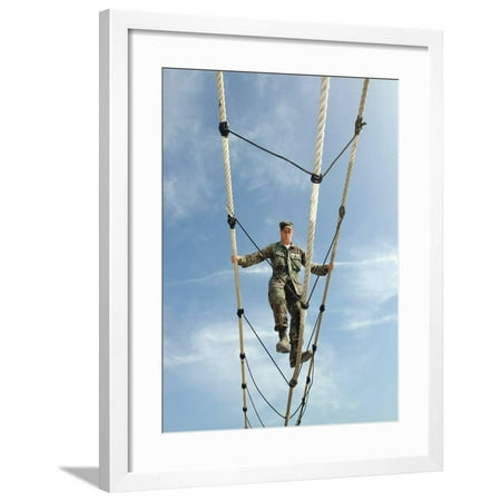 A Soldier Navigates An Obstacle On  the Training Course Framed Print Wall Art By Stocktrek