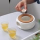 thumbnail image 4 of Calentador de tetera Calentador de tetera de porcelana Base de tetera con soporte de corcho Calentador de agua para té y café, 4 of 7