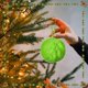 thumbnail image 4 of Juego de pompones de piel sintética de Navidad de 2,3 pulgadas con pompones verdes, adornos de bolas de peluche para colgar en el árbol de Navidad, 4 of 5