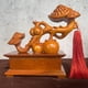 thumbnail image 4 of Rosewood carved persimmon symbolizing good fortune and auspiciousness; solid wood ornament for home, living room, TV stand, or office decoration., 4 of 4
