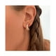 thumbnail image 4 of Aretes Xtellar Dorados Forma X Con Zirconias Cuadradas, 4 of 4