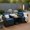 Dark Blue, variant on Resenkos 3-Piece Beige Wicker Outdoor Bistro Set – Tempered Glass Table + 2 Armchairs with Thick Removable Cushions for Balcony, Patio & Small Gardens
