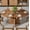 2-walnut, variant on 43.3–59" Extendable Dining Table for 4–8, Round Kitchen Table with Fluted Base & 4 Storage Shelves for Living Room, Walnut