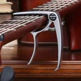 thumbnail image 1 of Metal Guitar Capo Aluminum Alloy Guitar Tuner Clamp Professional Key Trigger Capo for Acoustic Electric Musical Instruments silver, 1 of 6