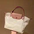 thumbnail image 1 of Bolsa de almacenamiento de pañales para bebé, bolso de mano clásico para mujer, bolsos de hombro bordados, bolso de mano plegable de nailon a la moda para ir de compras, 1 of 5
