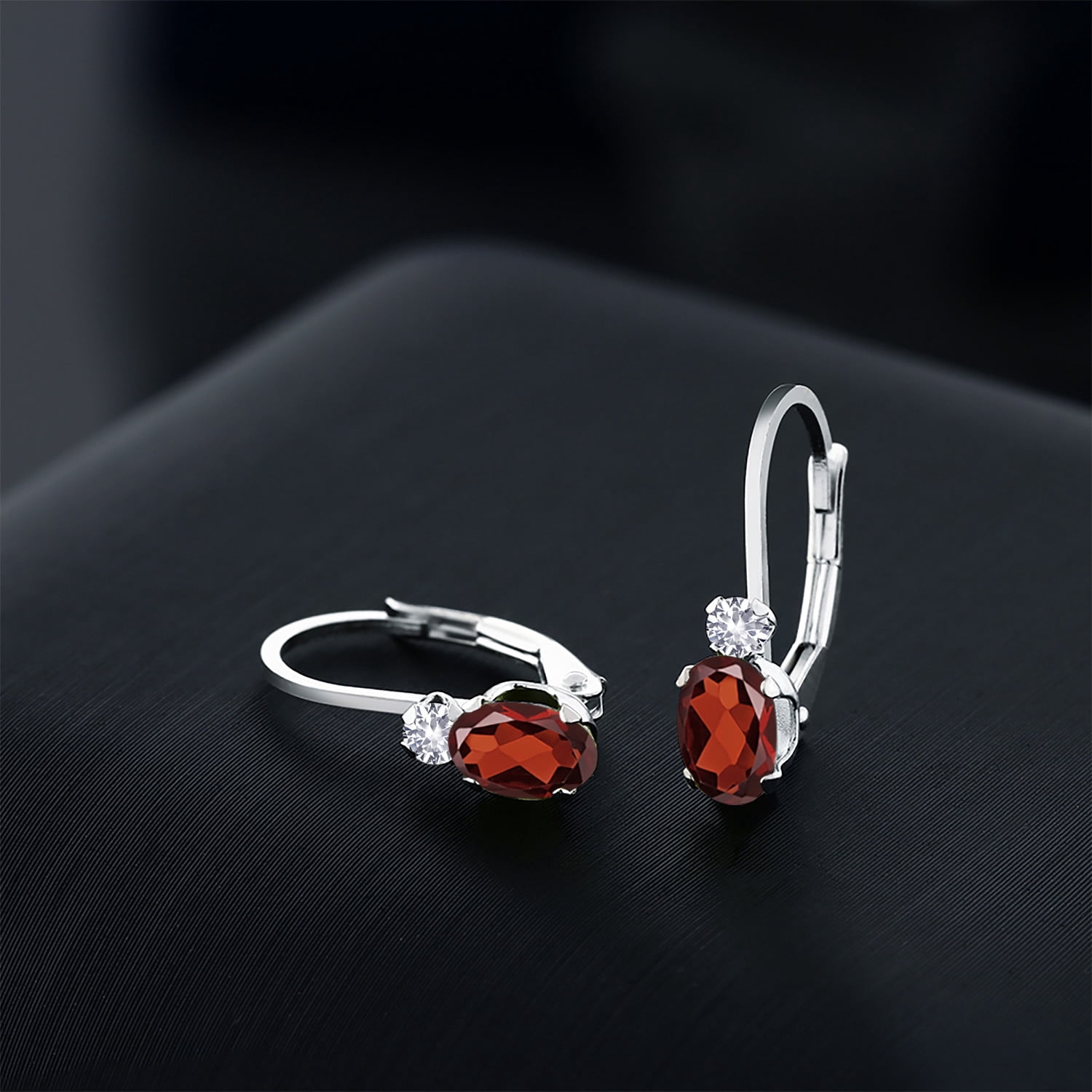 Gem Stone King 925 Sterling Silver Red Garnet and White Created Sapphire Leverback Earrings for Women (1.18 Cttw, Gemstone January Birthstone, Oval 6X4MM, Round 2MM, 3/4 inch)