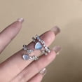 thumbnail image 2 of Anillo de circón con forma de ojo de gato y flor de amor con luz de luna azul, diseño de nicho de lujo ligero, anillo abierto para dedo índice, anillo avanzado, 2 of 6