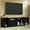 Black, variant on Madesa Large Entertainment Center with 1 Sliding Door, 5 Shelves and Open Shelves for 65, 75 Inch Media Storage Gaming Media Console Living Room and Bedroom Modern Wooden Television Stand - Black