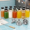 thumbnail image 1 of Botellas de muestra transparentes, minibotellas vacías, reutilizables, multiusos, botellas redondas de vidrio para aceites, salsas y uso decorativo. 12 piezas de 2 oz, 1 of 9