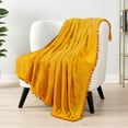 thumbnail image 4 of PAVILIA Fleece Throw Blanket for Couch with Pom Pom Fringe, Mustard Yellow, Soft Cozy Fuzzy Flannel Blanket for Sofa Bed, Large Lightweight Plush All Season Throw, 60x80 Inches, 4 of 9