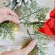 thumbnail image 4 of Seyotauo 6 FT Pre-lit Artificial Christmas Garland, Battery Powered with Pine Cones, Red Berries, Pine Needles, Lighted Christmas Wreath for Holiday Party, Xmas Tree Decorations, 4 of 6