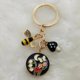 thumbnail image 1 of Lindo llavero de esmalte, abeja, seta, jardín, flor, mariposa, seta, joyería hecha a mano, regalo de recuerdo, 1 of 4