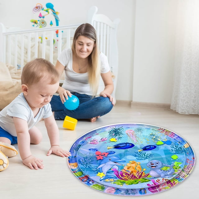 xihbxyly tapete de juego acuático multicolor, vista frontal centrada de tapete redondo para bebé con diseño interactivo de peces, delfín y plantas marinas; tecnología de sensor de agua espesa indicada en especificaciones; uso en piso para juegos de bebés y mascotas, fácil instalación y limpieza, también adecuado para estimulación sensorial.