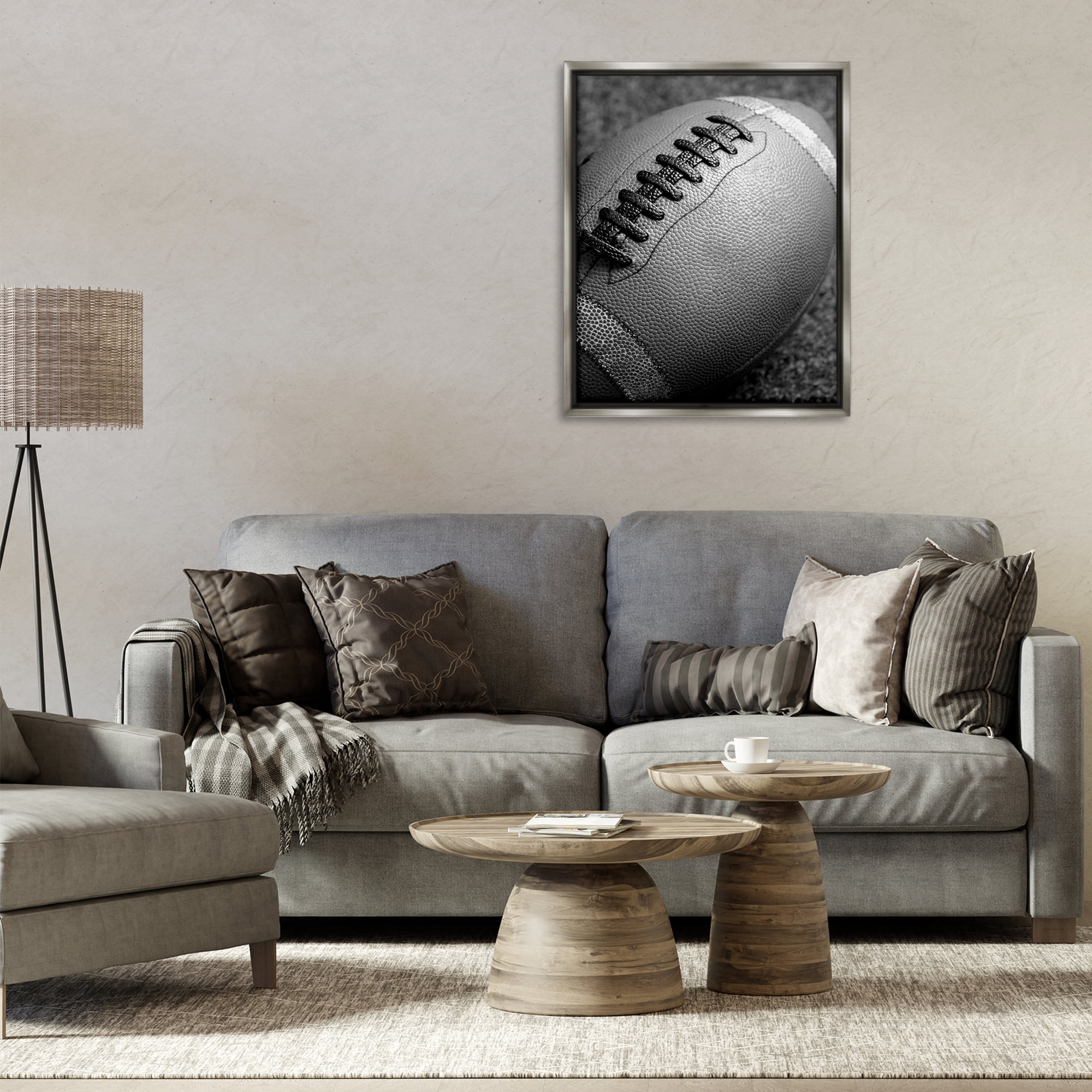 Stupell Industries Close Up Football Sports Photography Gray Floater Framed Canvas Art Print Wall Art, 25 x 31