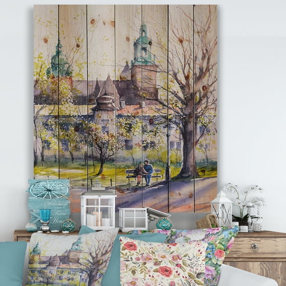 Designart 'Castel Through The Trees of The Park With Couple Sitting on Bench' Country Print on Natural Pine Wood