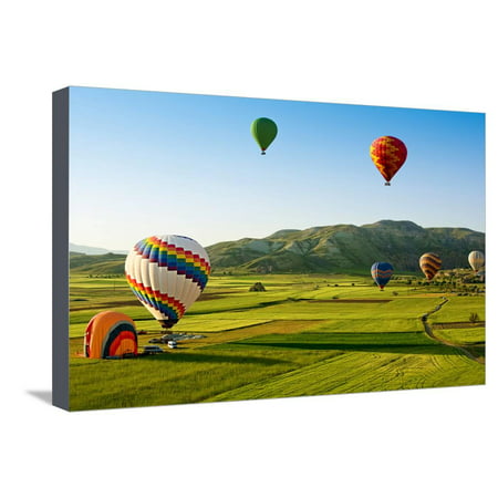 Hot Air Balloons Fly over Cappadocia is known around the World as One of the Best Places to Fly Wit Stretched Canvas Print Wall Art By Olena (Best Places Around Paris)