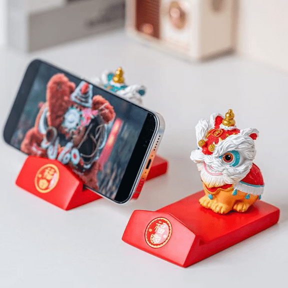 A mobile phone holder with lion dance as its theme, suitable for desktop and bedside drama watching, and an anti slip stable holder for gift decoration and accessories