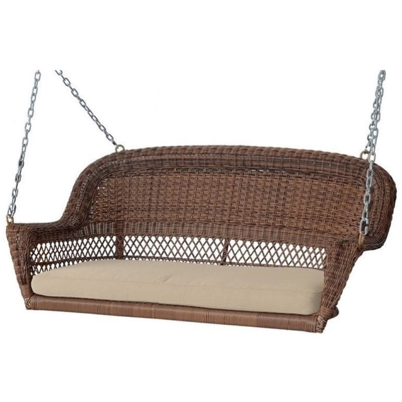 Pemberly Row Wicker Patio Porch Swing with Cushion in Honey and Tan